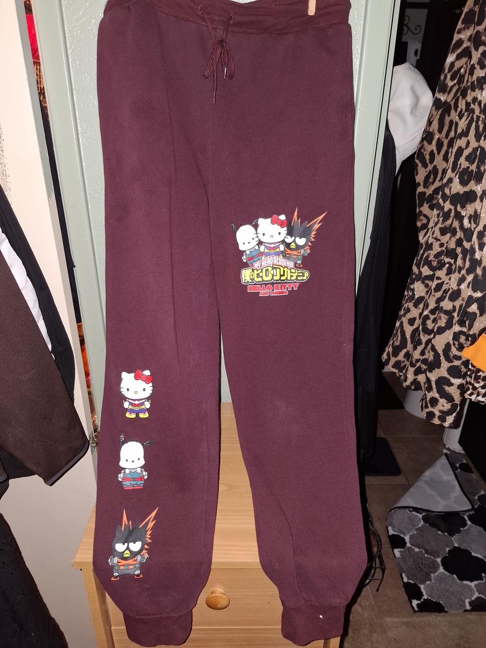 Hero Academia x Hello Kitty graphic jogger pants featuring fun crossover...